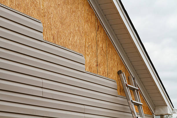 Professional Siding Installation technician working in Bedford, IN